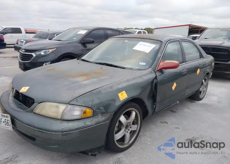 1998 Mazda 626 Dx/Lx z USA, uszkodzony, nr VIN 1YVGF22C3W5772322